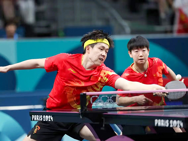 1723081074957655.jpeg 2024年7月30日巴黎奧運會乒乓球混雙決賽,孫穎莎和王楚欽比賽照片.jpg